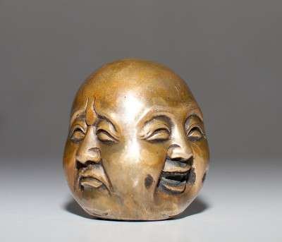 4_faces_buddha
